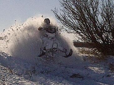 My son on his new to him 2008 Yamaha Phazer. First time out this year in the dump of snow we got this weekend! Had a great day in nice soft powder! My GoPro battery died so I was left with the blackberry to get this shot.