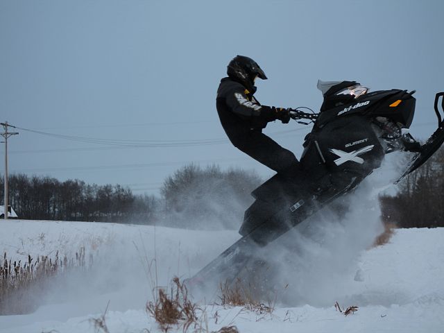 Summit X wheelie out of the ditch