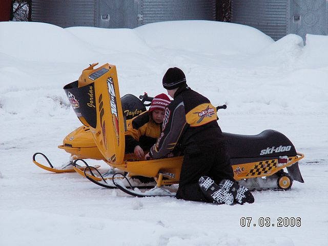 Jordan and Taylor Wittke on an afternoon ride in the yard on their mini z's