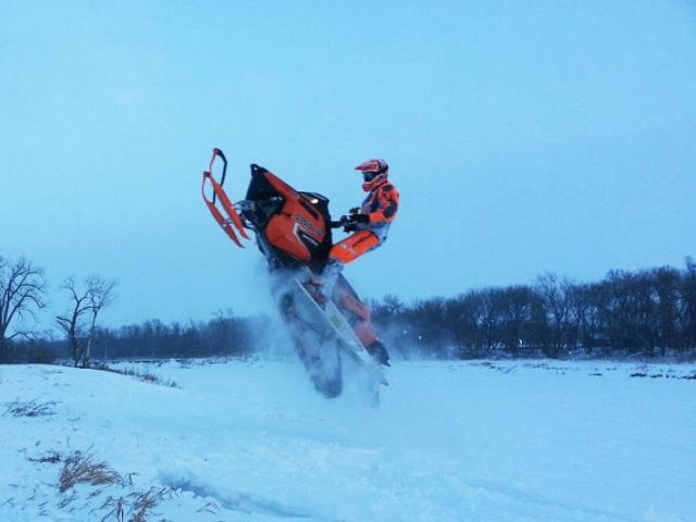 Getting air after climbing up the 15' tall steep shoreline drop