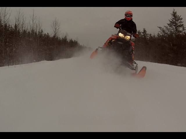 snapshot from GoPro mounted to back bumper of buddies sled looking back at me