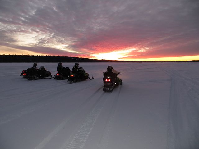 After a days ride to Falcon Lake using Sunset Trail Riders trails and Whiteshell trails the sun was setting on Lake of the Woods heading home and I had to stop for a picture.