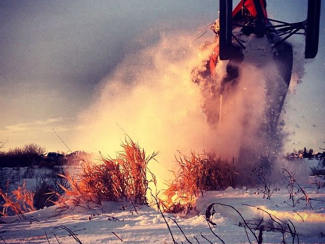 Climbing the 10 foot slough edge drifts. 