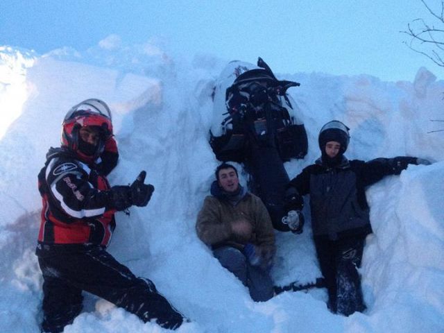 Friends taking turns getting stuck in fresh powder!