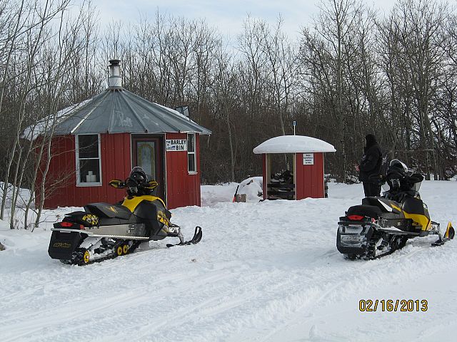 This is the coolest warm up shack, stained glass door and all!
