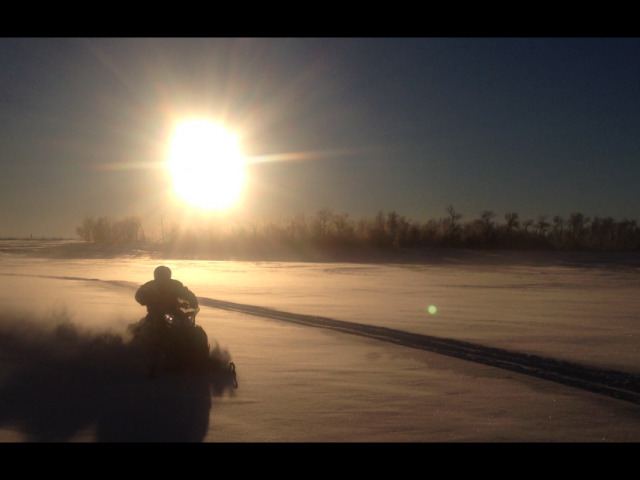 Enjoying fresh snow with a beautiful sunny sky