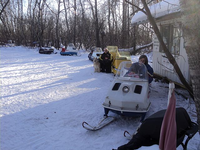 2 year olds Wasylia with G.ma Bernie and Lucas with Dad (Kris) and puppy JC in front of North 40 Shelter on the Family "Vintage Ride Day"