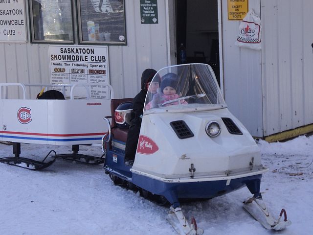 2 yr olds Wasylia and Lucas on '67 Polaris Mustang in front of North 40 Shelter...SWEEEEEEET!!!! 