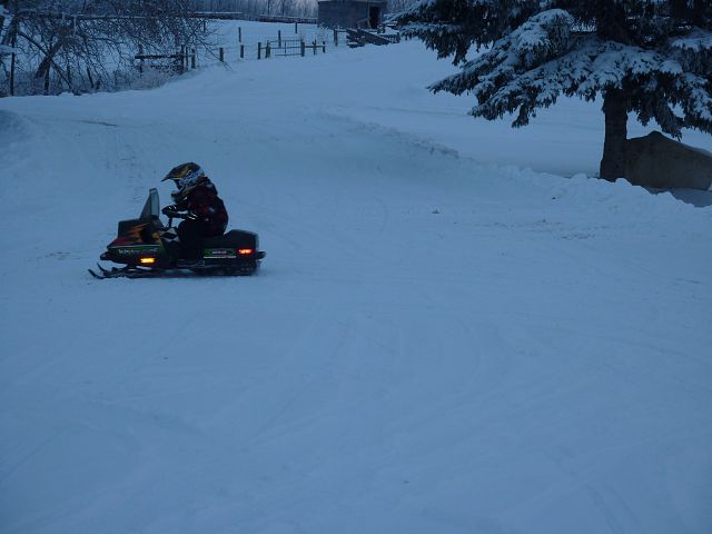 Near Greenwater Park at New Years. Our grandson on a Kitty Cat