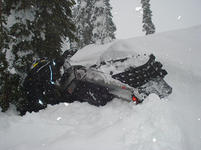 Trees, they're like a magnet. Flipped the machine over and pull on the skies and your away! 