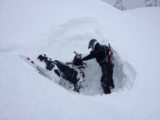 stuck in a sink hole after hitting a tree half way up a shute