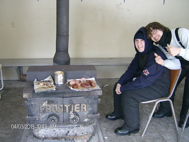 Enjoying a meal at Glen Bay Hut