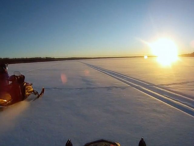 Taken with a Go Pro camera while riding into the sunset at Child's Lake in the Duck Mountains.