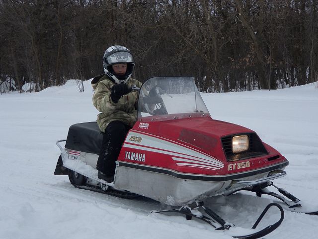 our Grandson riding his first sled