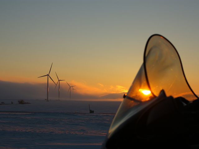 The fog quickly encompasses the wind turbines, one by one. Within two minutes it went from clear skies to being completely engulfed in fog.
