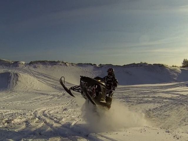 My friends first day on his 2010 rush and we found a lot of powder to play in