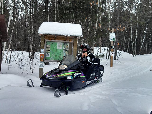 Charles Robertson after looking at map and getting ready to ride.