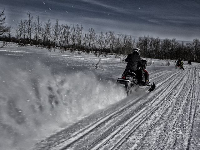 My wife getting used to her new sled.