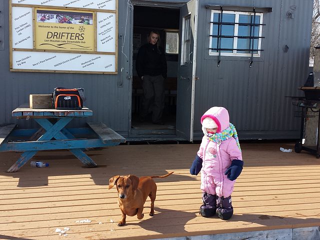 Grace enjoying the march sun with her bud