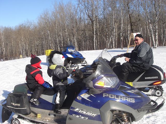 Cousins Sawyer and Evan discuss the trails with Evan's Grandpa Tom