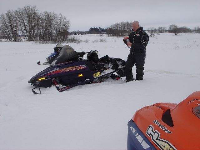 Cousins taking a break from some powder playing