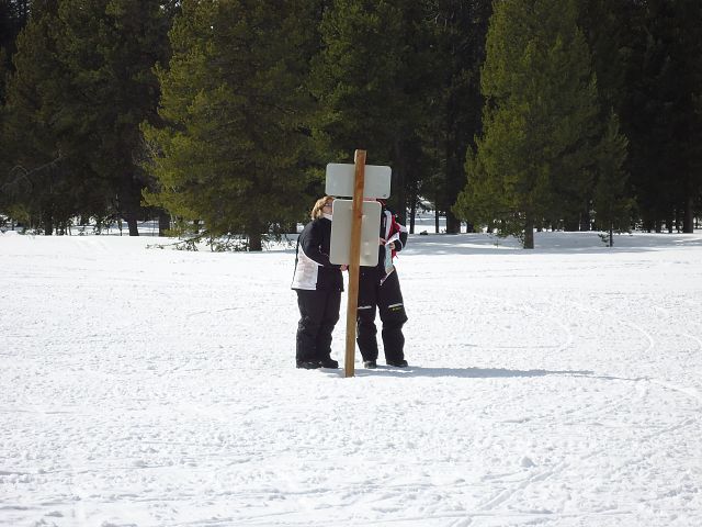 Consulting the trail map.