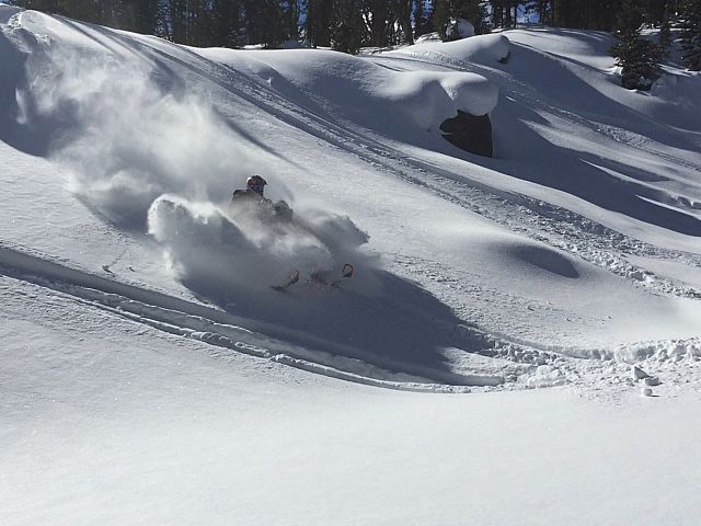 Mr Hoffman landing in some powder.