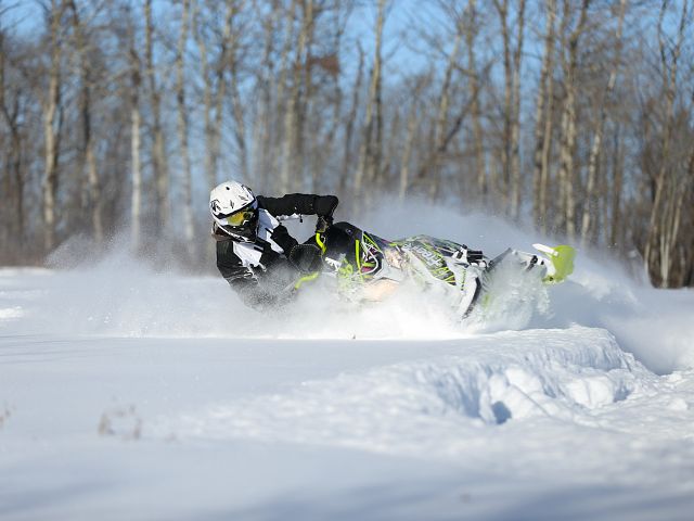 My brother, Brendon, playing in the powder.