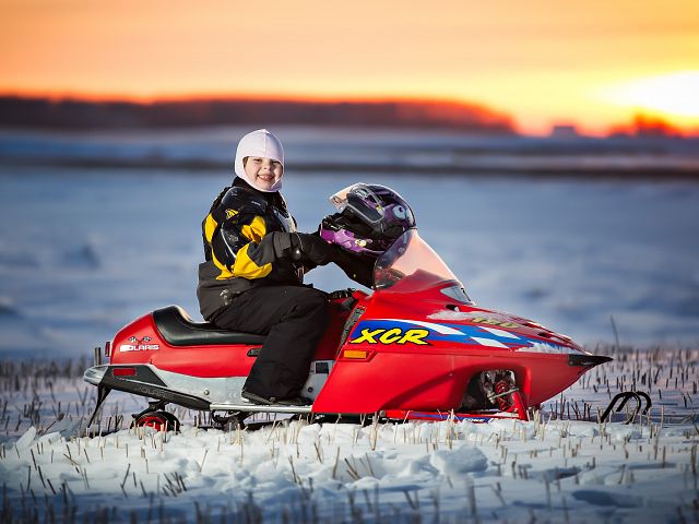 She loves snowmobiling.