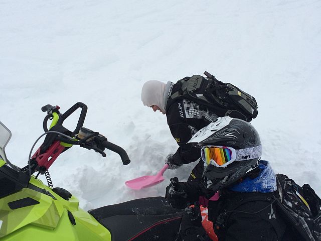 Baby girl making dad dig her out