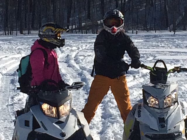 Two young girls just got done trying to do doughnuts