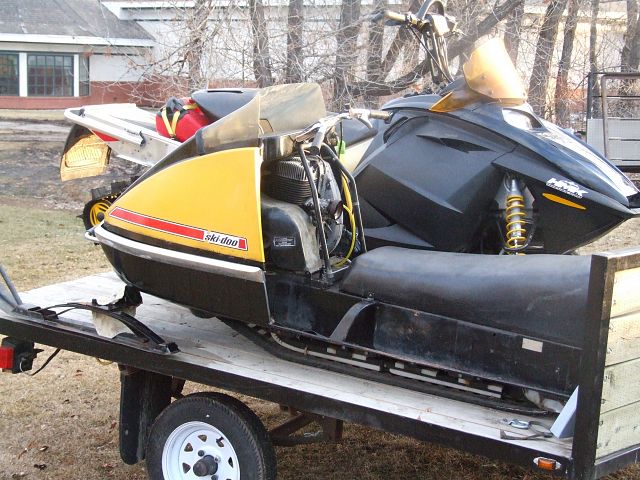 The big guy next to me is my grandson 2004 800 Summit. 