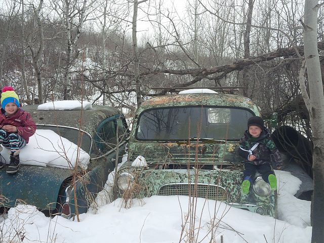 Spring ride in the sidekick, check out the old cars dad!