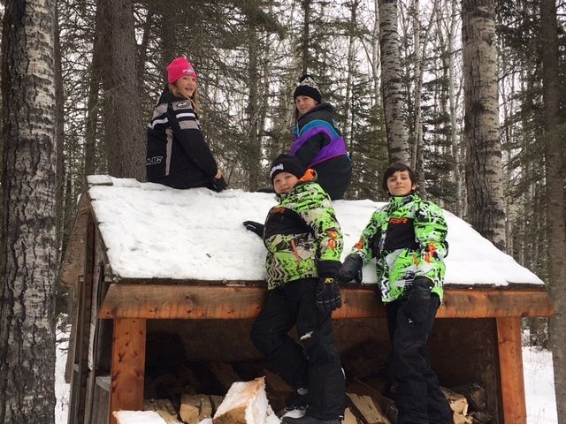 climbing on the wood shelter