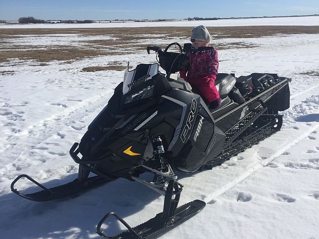 Future Snowmobiler going for a rip. 