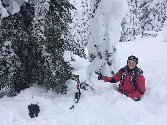 Kelsey tags a loaded tree....