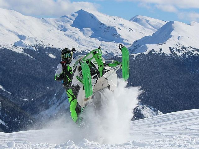 skis up on a blue bird day