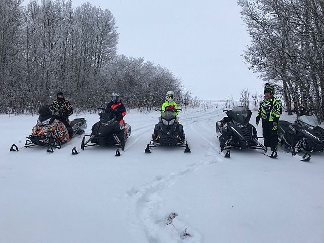 Family sledding  at Christmas time 