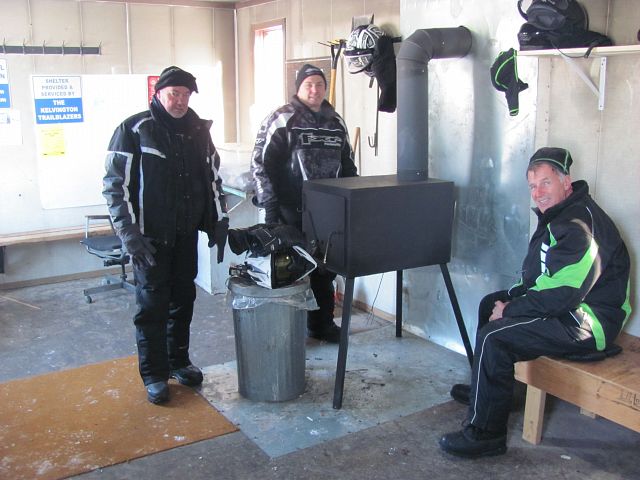 Warming up by the firebox