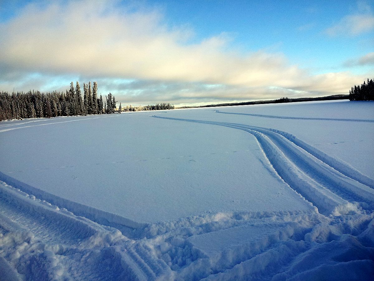 Mclure lake in Northern Sask. First snowmobile tracks on the lake this season