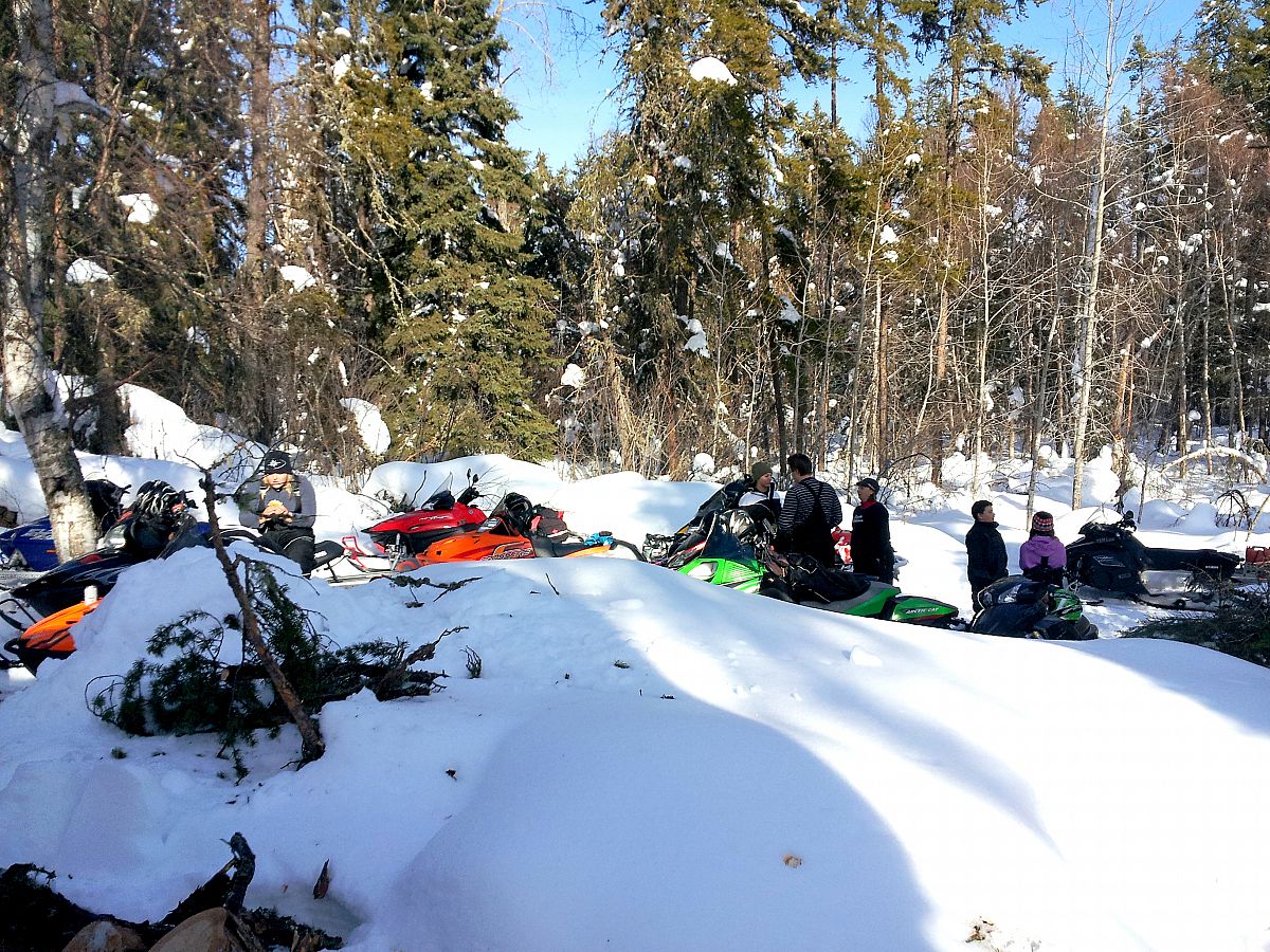 At a snowed in checkpoint at the Ramsey Bay Snowmobile Club annual rally Weyakwin Lake