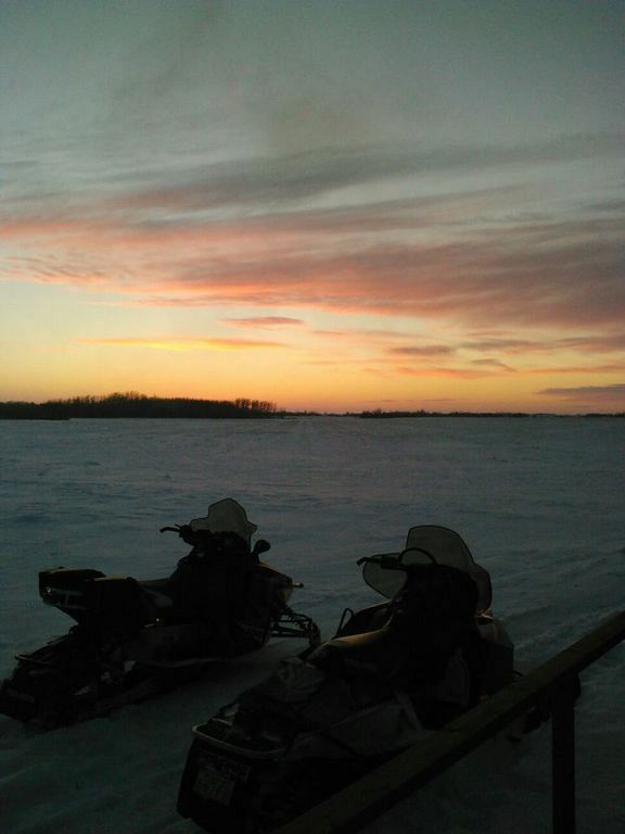 Sleds in the sunset.