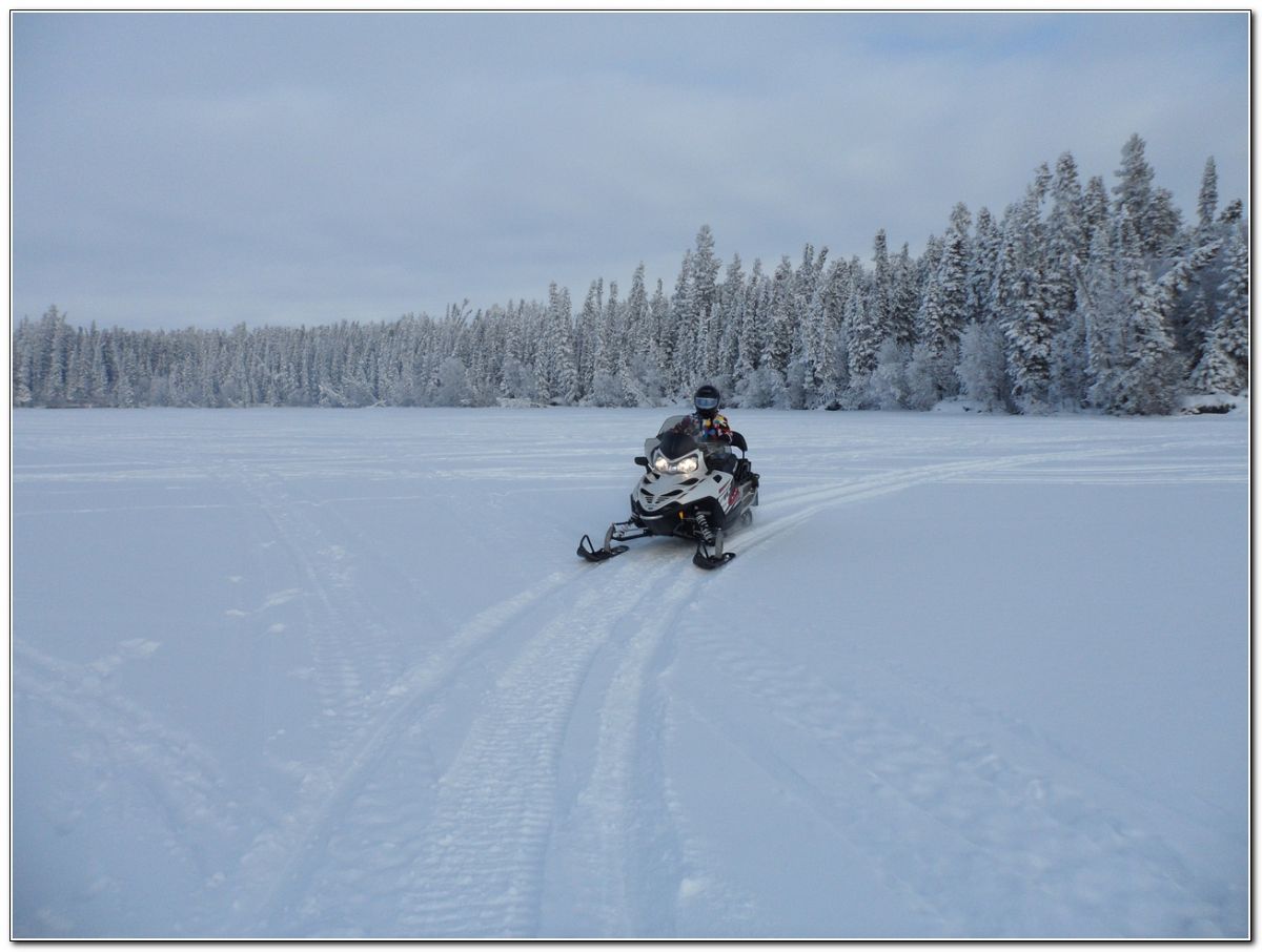 Snowmobiling on Little Bear Lake as well as trail riding on SSK Esker 208 Trail System