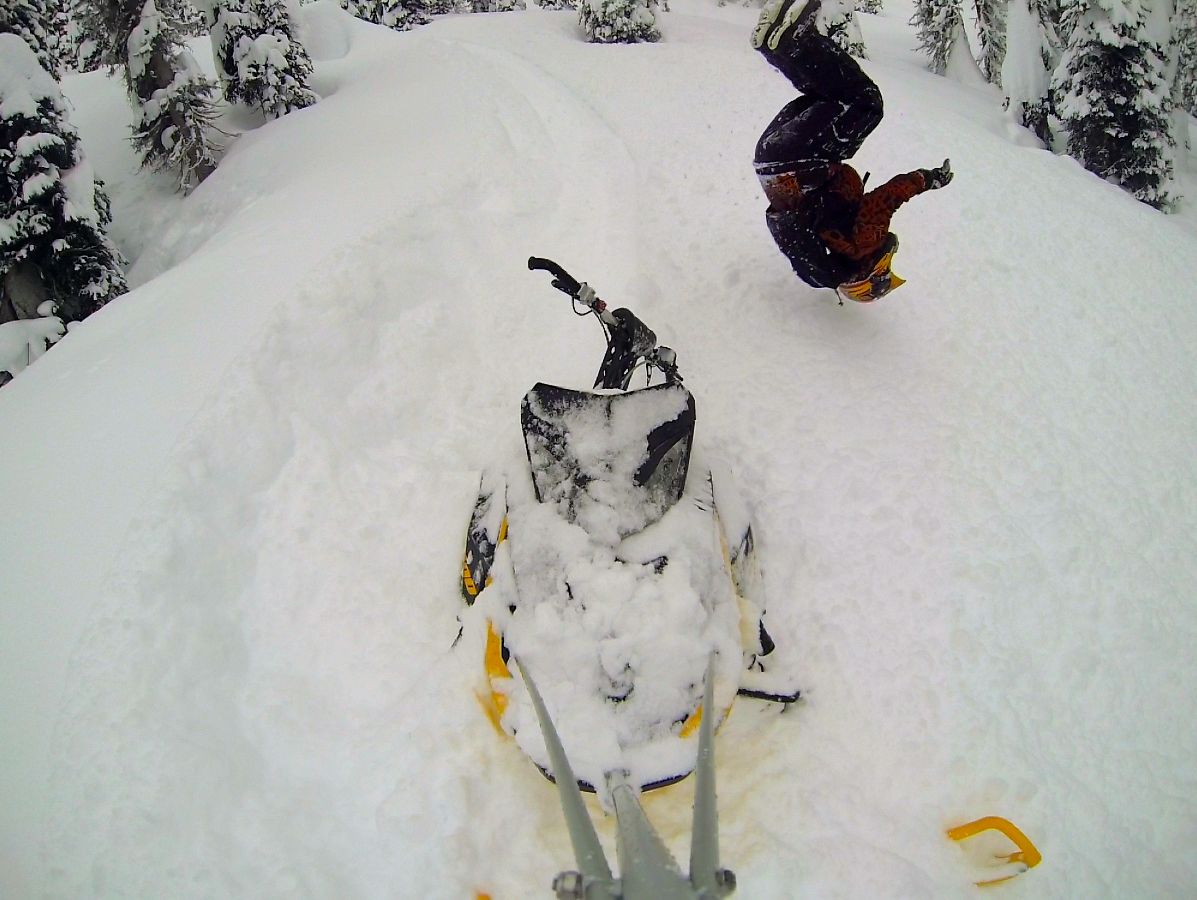 Stuck in the pow, might as well back flip into the fluff!