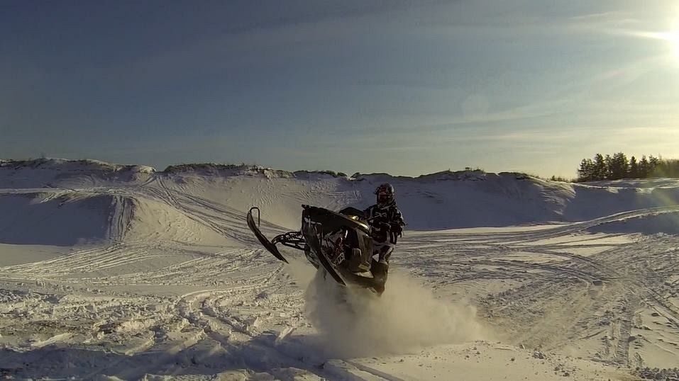 My friends first day on his 2010 rush and we found a lot of powder to play in