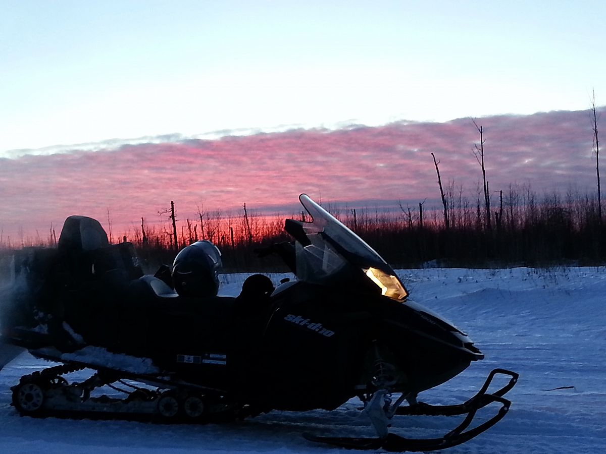 Sunset Silhouette of Ski-doo