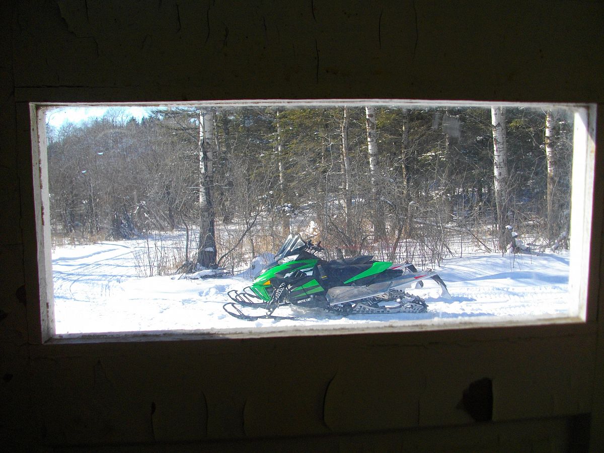 Sled waiting for the rider who is warming up in the shack