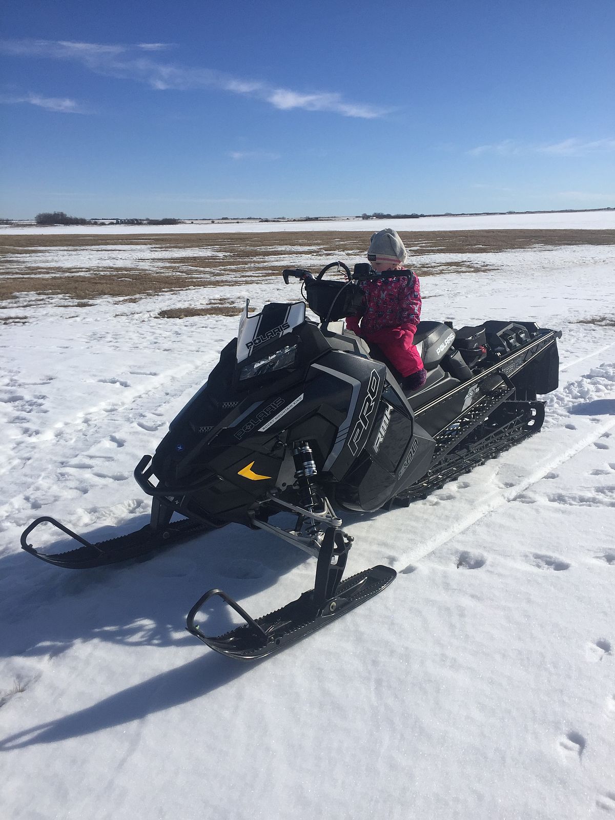 Future Snowmobiler going for a rip. 