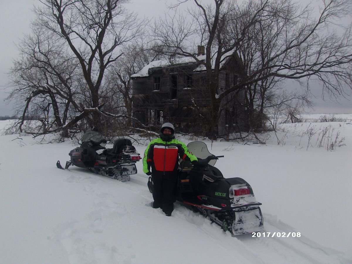 The ghosts of the past watch the snowmobilers speed by