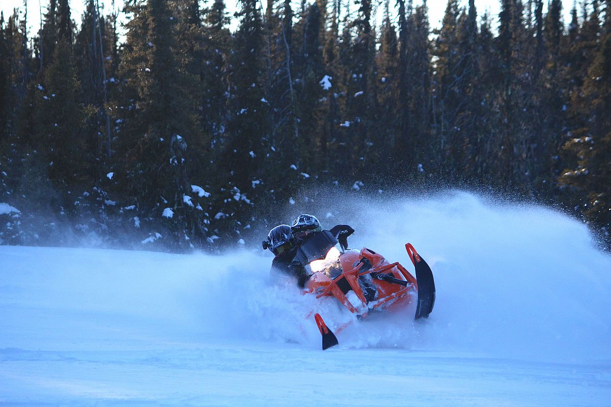 Family ride in Swan Hills Dale teaching his son how to carve, all you could hear is laughing as he was having so much fun!! Thats what snowmobiling is about! 